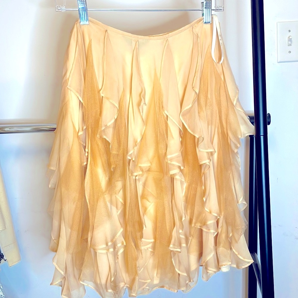 Ruffled cream tulle skirt by Asian designer